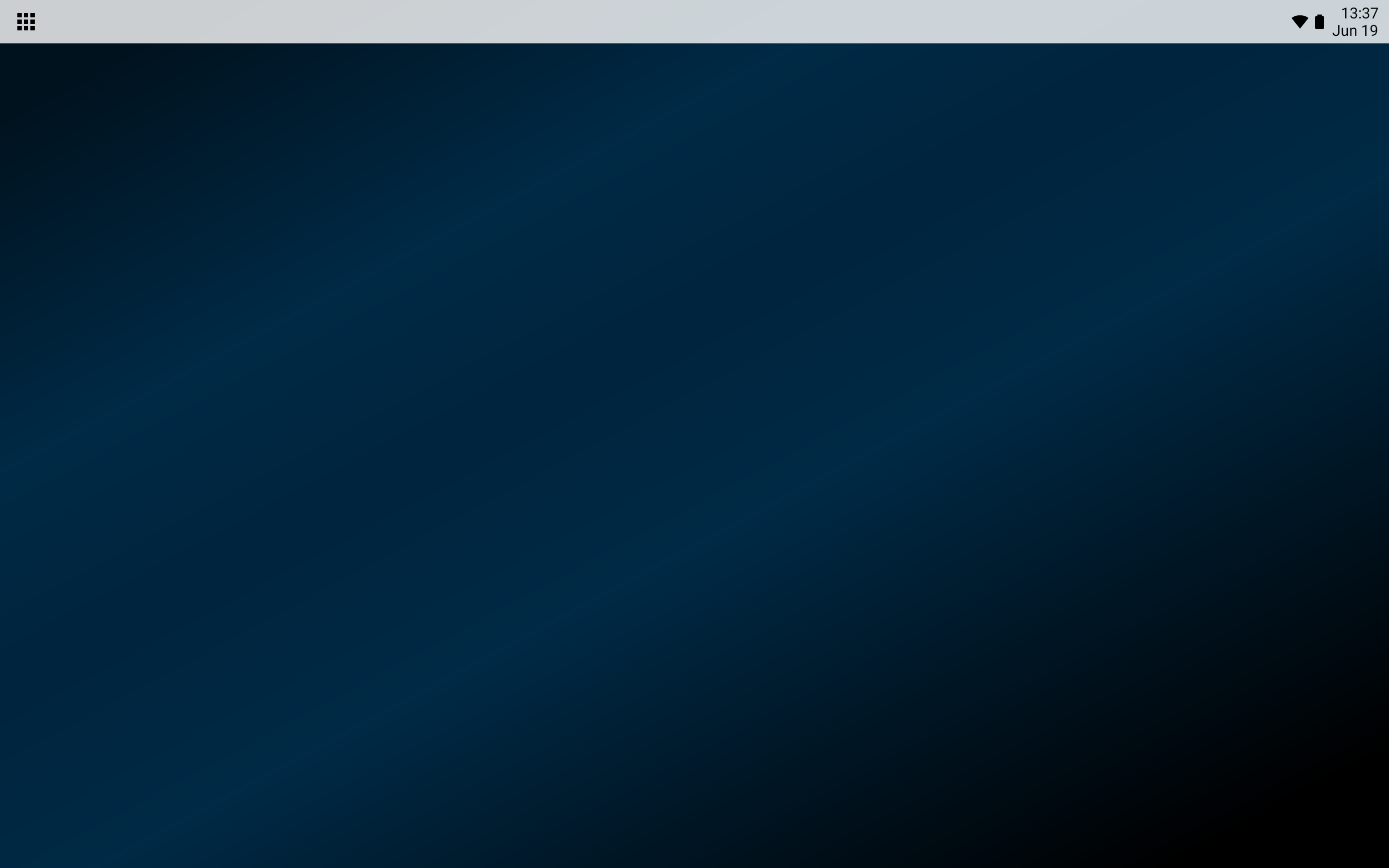 On a large screen, with all apps closed, there is only the status bar with the time, Internet icon, and battery icon.